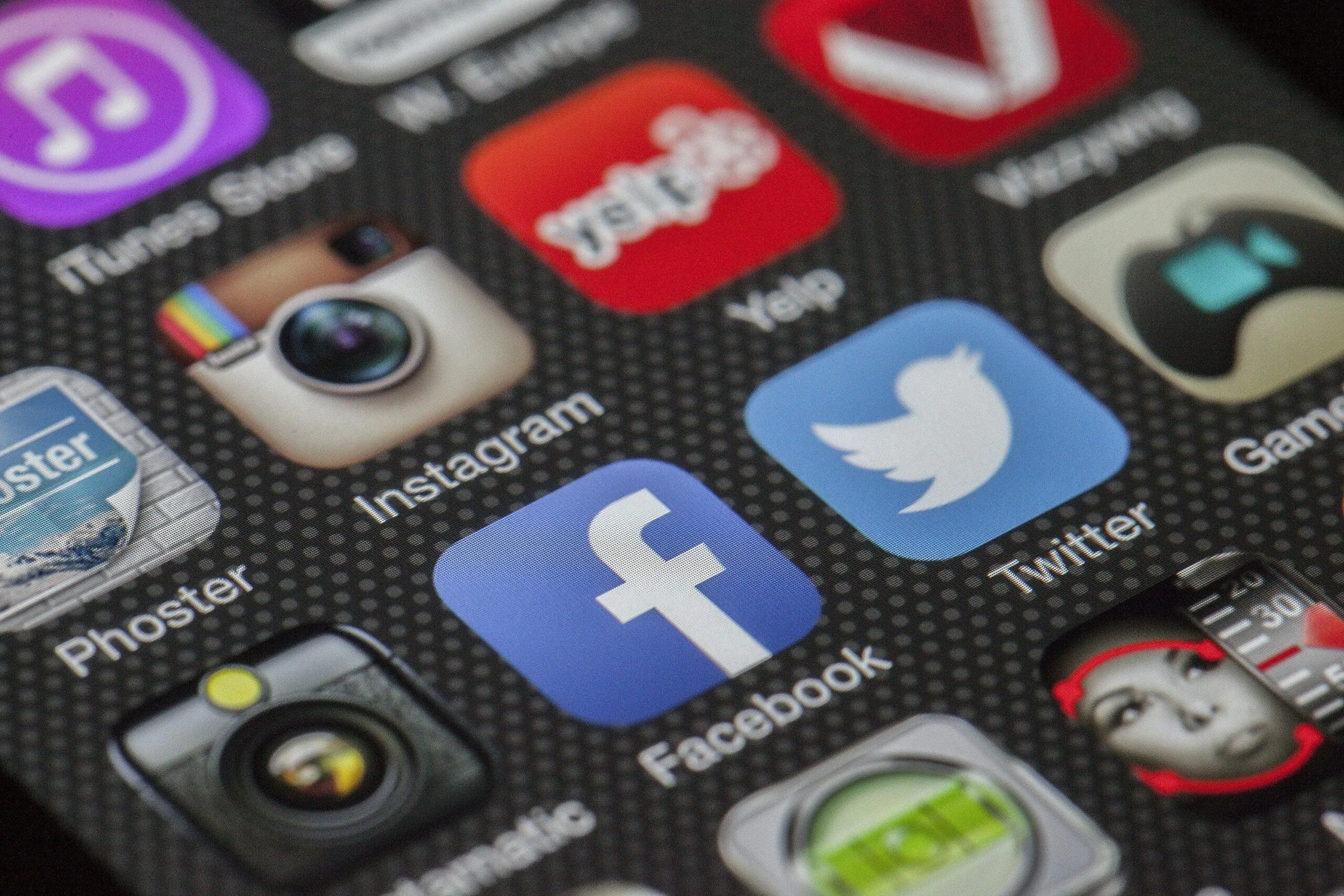 Close-Up Image Of Various Social Media App Icons On A Smartphone Screen.